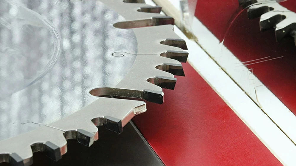 The Infinity Combo-Max Saw Blade has an ATB-R grind. the front tooth features a chamfered raker geometry with a deep gullet for clearing sawdust followed by for 15° ATB teeth. giving this saw blade its distinct look.