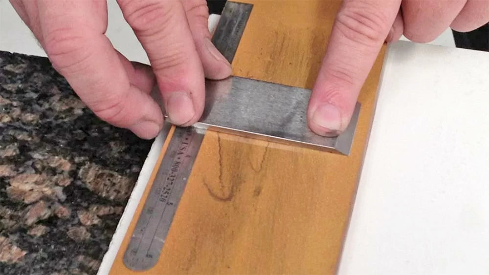 On a plane blade, you will want to use the ruler trick.