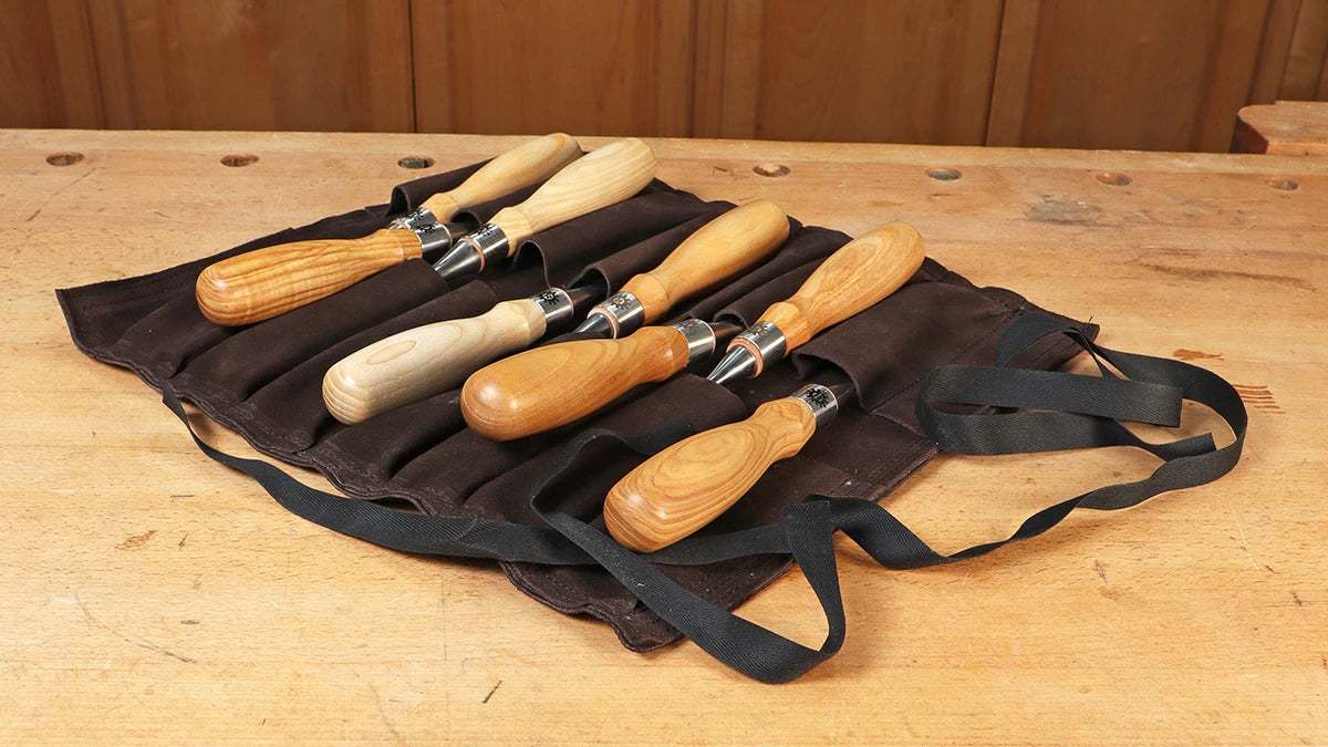 Keep the chisels sharp and safe in this leather tool roll.
