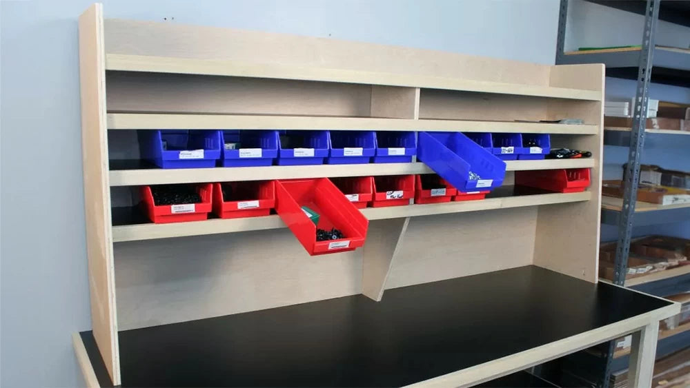 The shelves and edging are sized and spaced to secure the plastic shelf bins when they're pulled out for easy access.