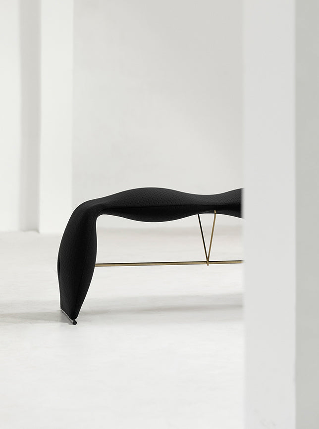 Sculptural shapes, embellish the furnishings of the space.