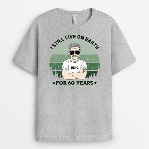 Personalised I Still Live On Earth For 60 Years T-Shirts as 60th Birthday Gift Ideas For Him UK