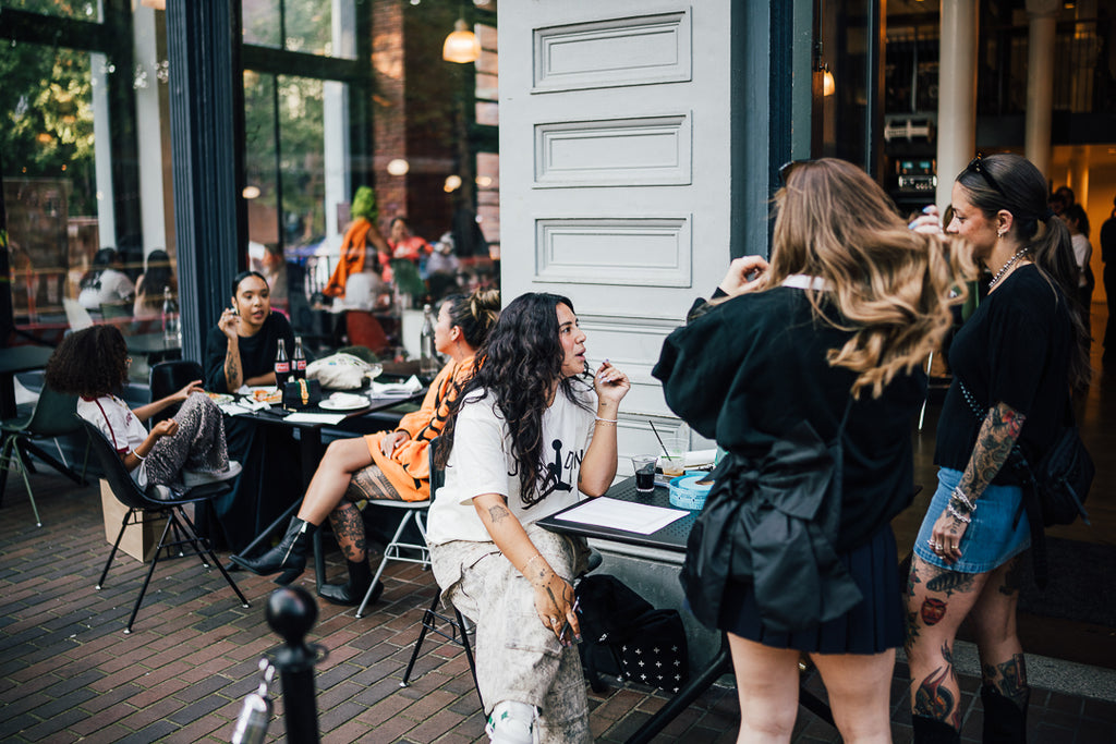 Group of women talking at a cafe