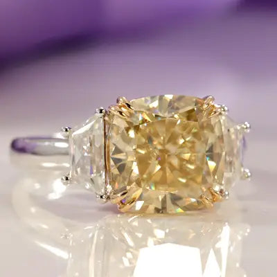 three-stone yellow radiant and trillion lab diamond engagement ring.