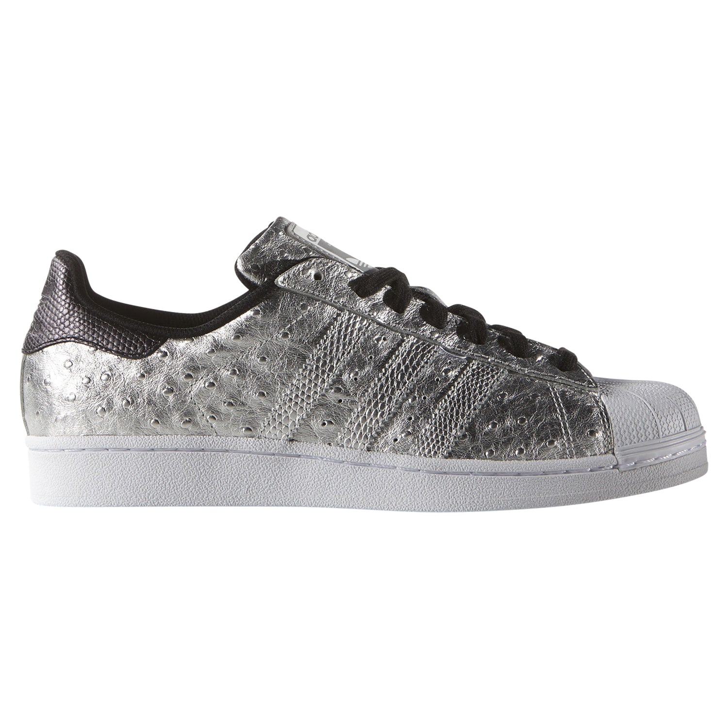 black and silver adidas trainers