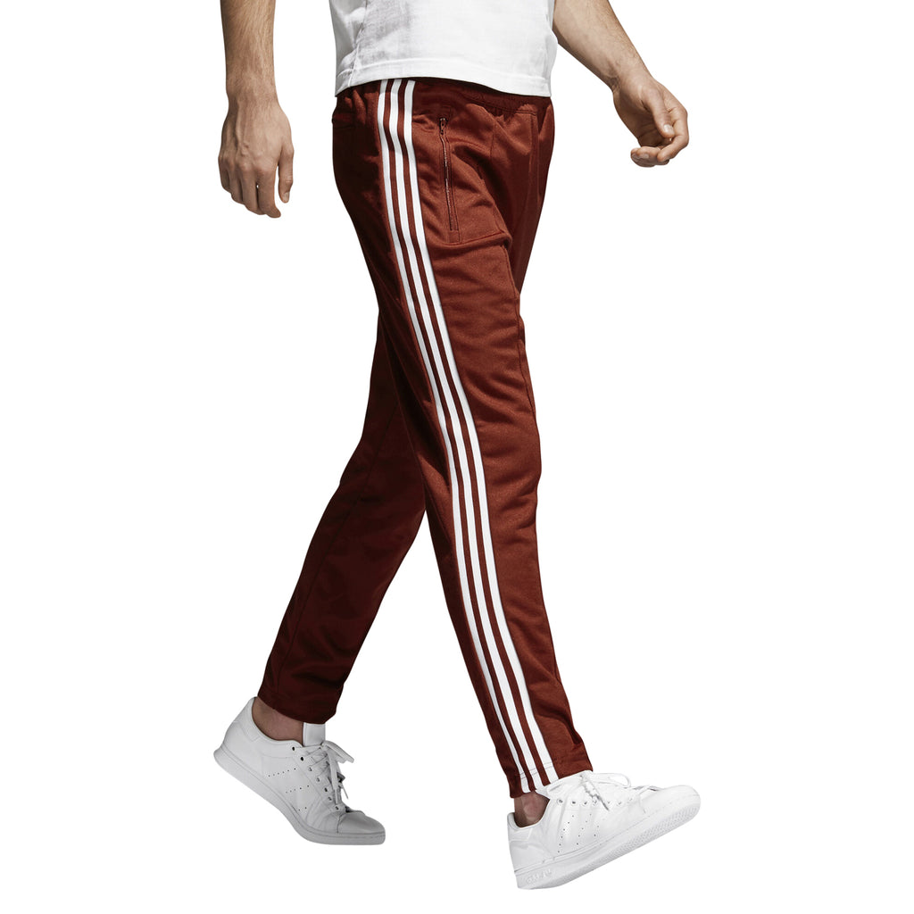 red adidas track pants