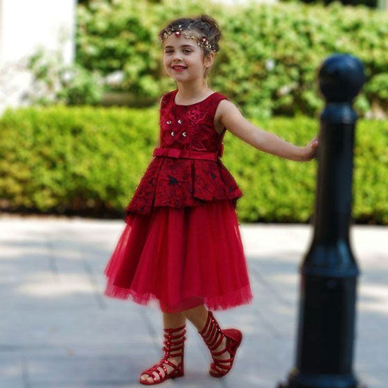 a dark red peplum dress