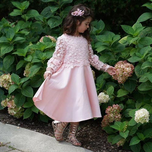 a pink tea-length dress