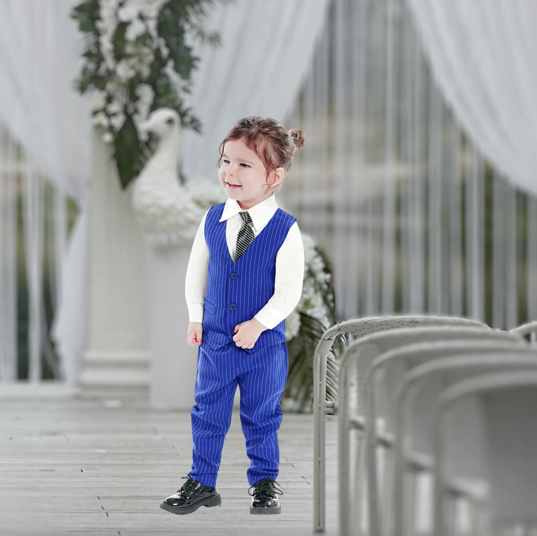 Toddler wearing blue striped pants and vest