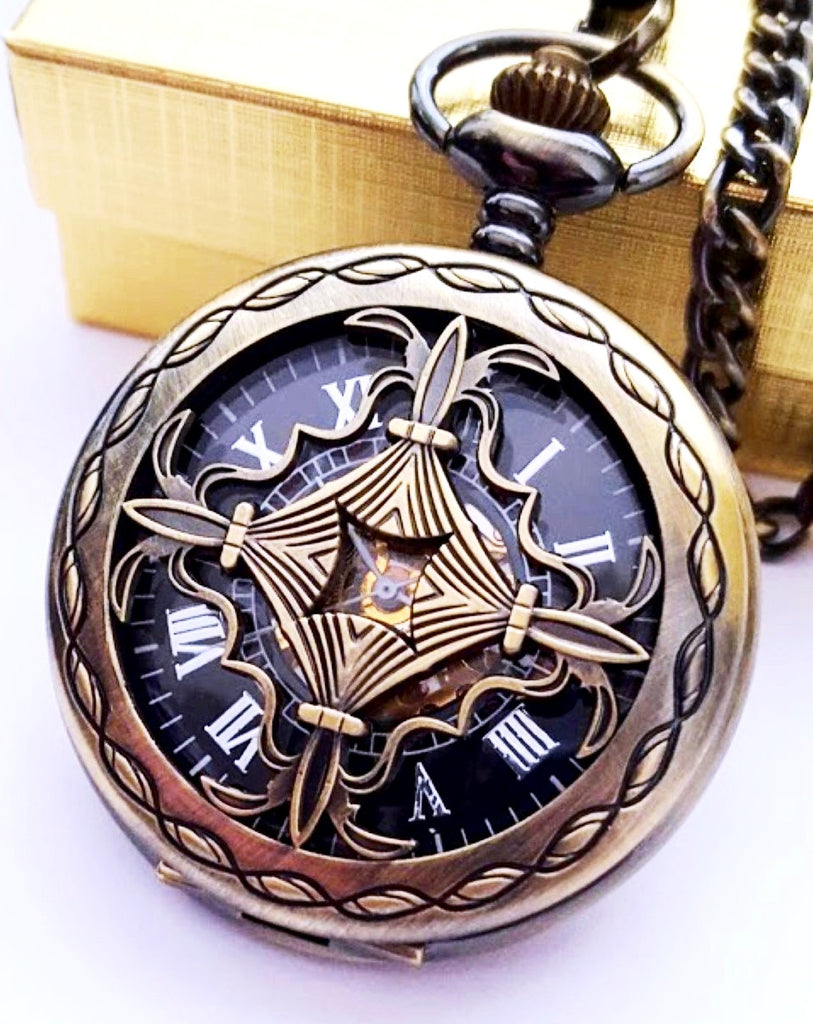 black and gold pocket watch