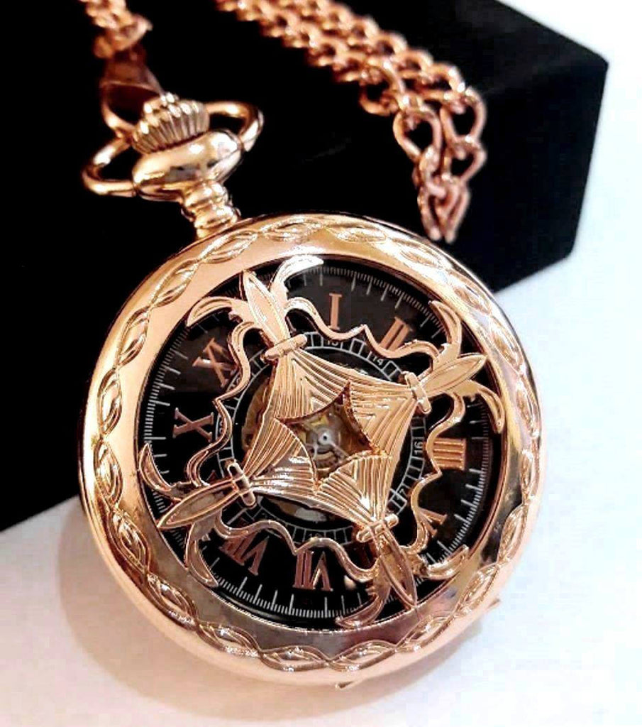 black and gold pocket watch