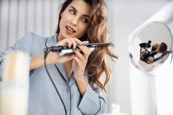 using heated curling irons damage