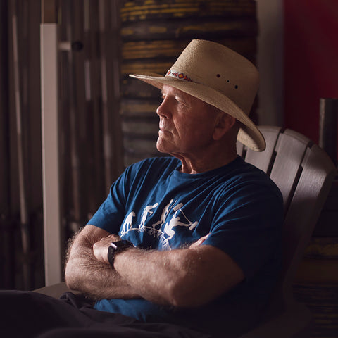 mike burgener weightlifting coach sitting in a chair