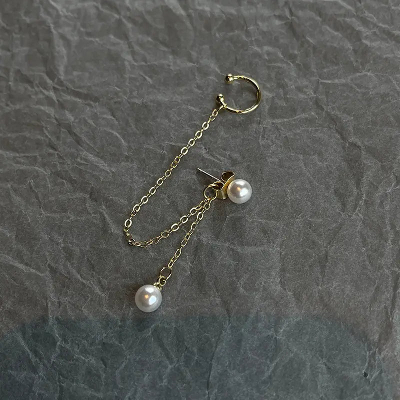 Un accessoire de boucle d'oreille de mode en perles élégantes de luxe pour les femmes