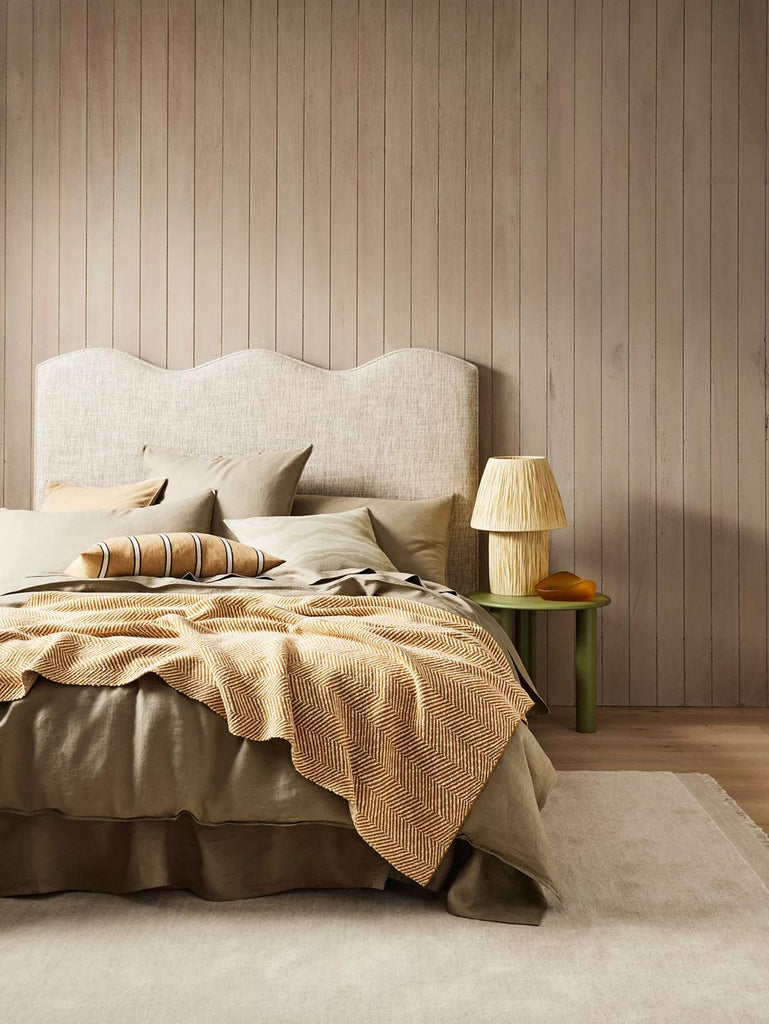 Weave Home nz bedroom setting featuring Ravello premium linen bedding, santa pollini cushions and a new weave floor rug