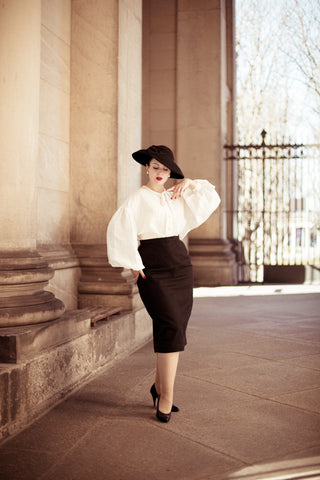 Puffy White Top, Black Hat, And Long Black Pencil Skirt