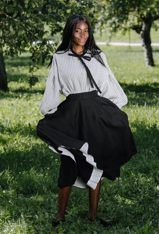 Vertical Striped Sleeves And Black Skirt