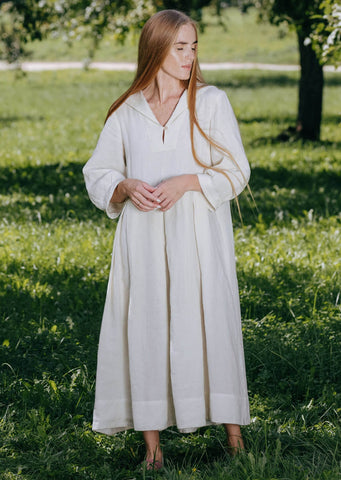 Lady wearing Son de Flor sailor dress in nature