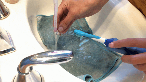 Holding a ring under the hot tap