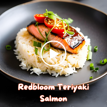 Teriyaki salmon on a bed of rice garnished with spring onions and chili, presented on a black plate.