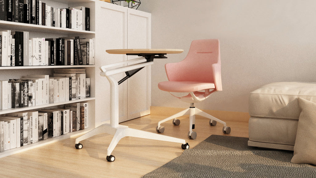 pink work chair and small work table in living room