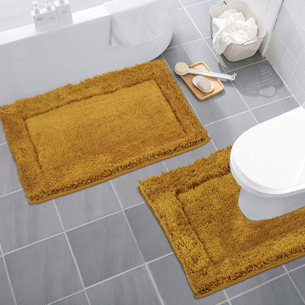 orange bath mats and towels