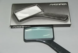 Magnifier with handle