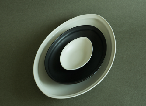 black ceramic boat plate