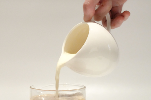 White ceramic milk pitcher/dispenser