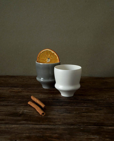 White ceramic belly coffee cup