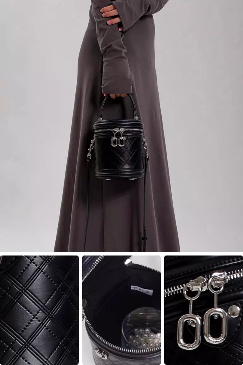 cowhide crossbody bucket bag with adjustable strap