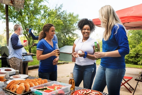 friends-celebrating-eating-tailgate-party