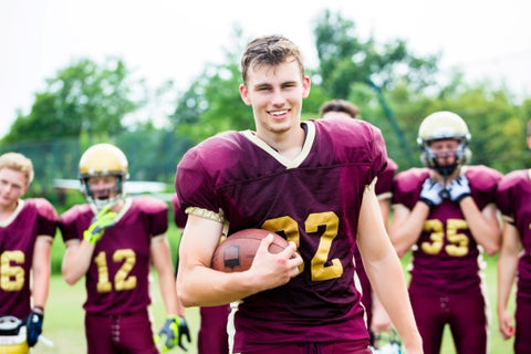 american-football-player-showing-trick-with-ball