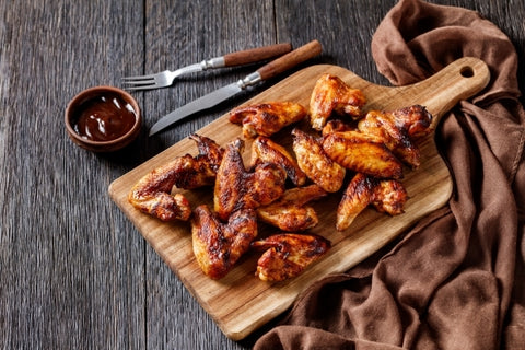 crispy-fried-chicken-wings-wooden-board