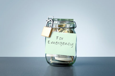emergency-savings-written-jar-with-dollars-banknotes-money-concept-money-saving-rainy-day