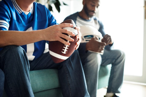 men-watching-american-football-match