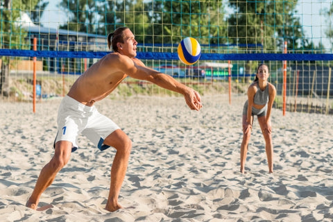 side-view-male-volleyball-player-playing-beach