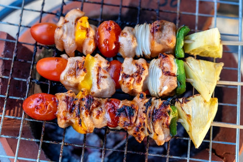 skewers-with-pieces-grilled-barbecue-green-bell-pepper-red-tomato-meat-sell-street-market-thailand-closeup