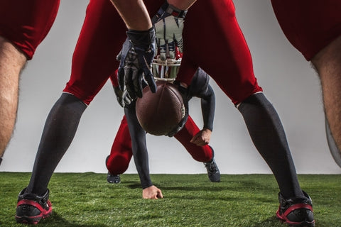 three-american-football-players-action-green-grass-gray-background