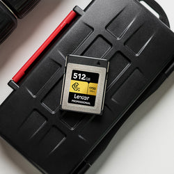 Lexar 512 GB CFexpress Type B card resting on hard memory card case