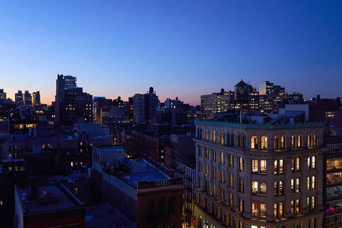 cityscape from rooftop at night