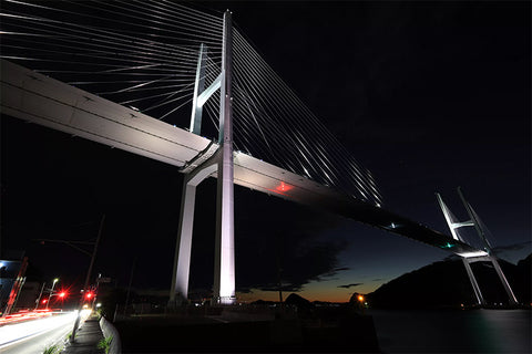 Night shot of bridge over river