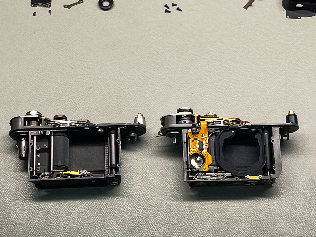 The shutter mechanism of the 1956 M3, on the left, is remarkably similar to the modern shutter assembly used today.