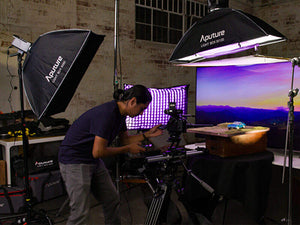 videographer using the 30120 light box