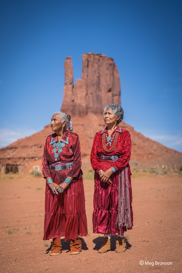 portrait of women by mitten for Navajo nation relief project