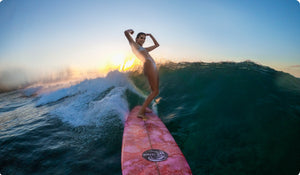 surfer taking a selfie video with gopro max lens mod