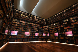 library room with floor to ceiling bookshelves