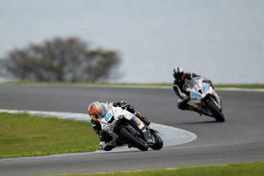 motorcycle racers on a track