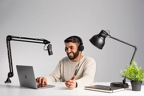Man recording audio with NT-USB Mini on desktop