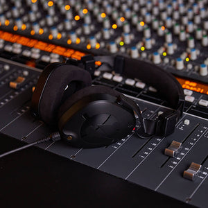 Incredible Accuracy, Exceptional Clarity - headphones on soundboard